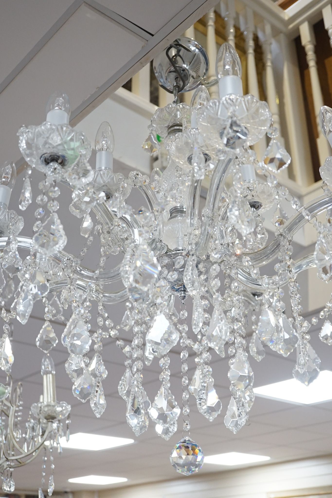 An 8 branch, 12 light chandelier